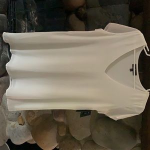 Lulu’s! Small white v neck short sleeve dress.